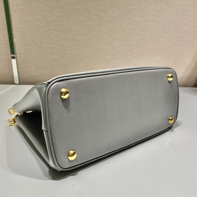 Pra*a top handle bags